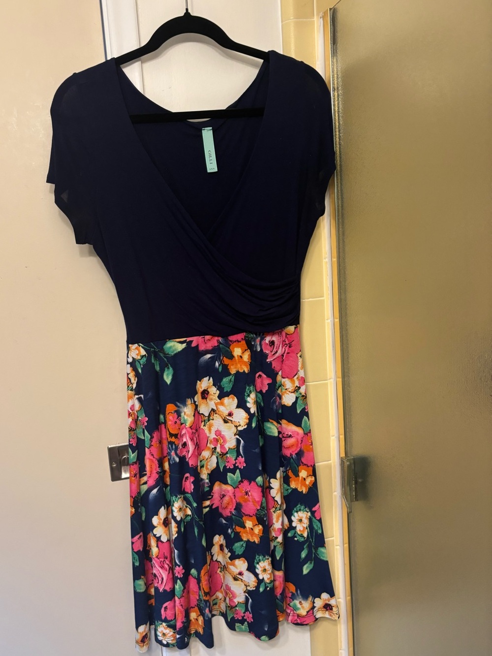 Navy v-neck Gilli dress with floral skirt, size small
